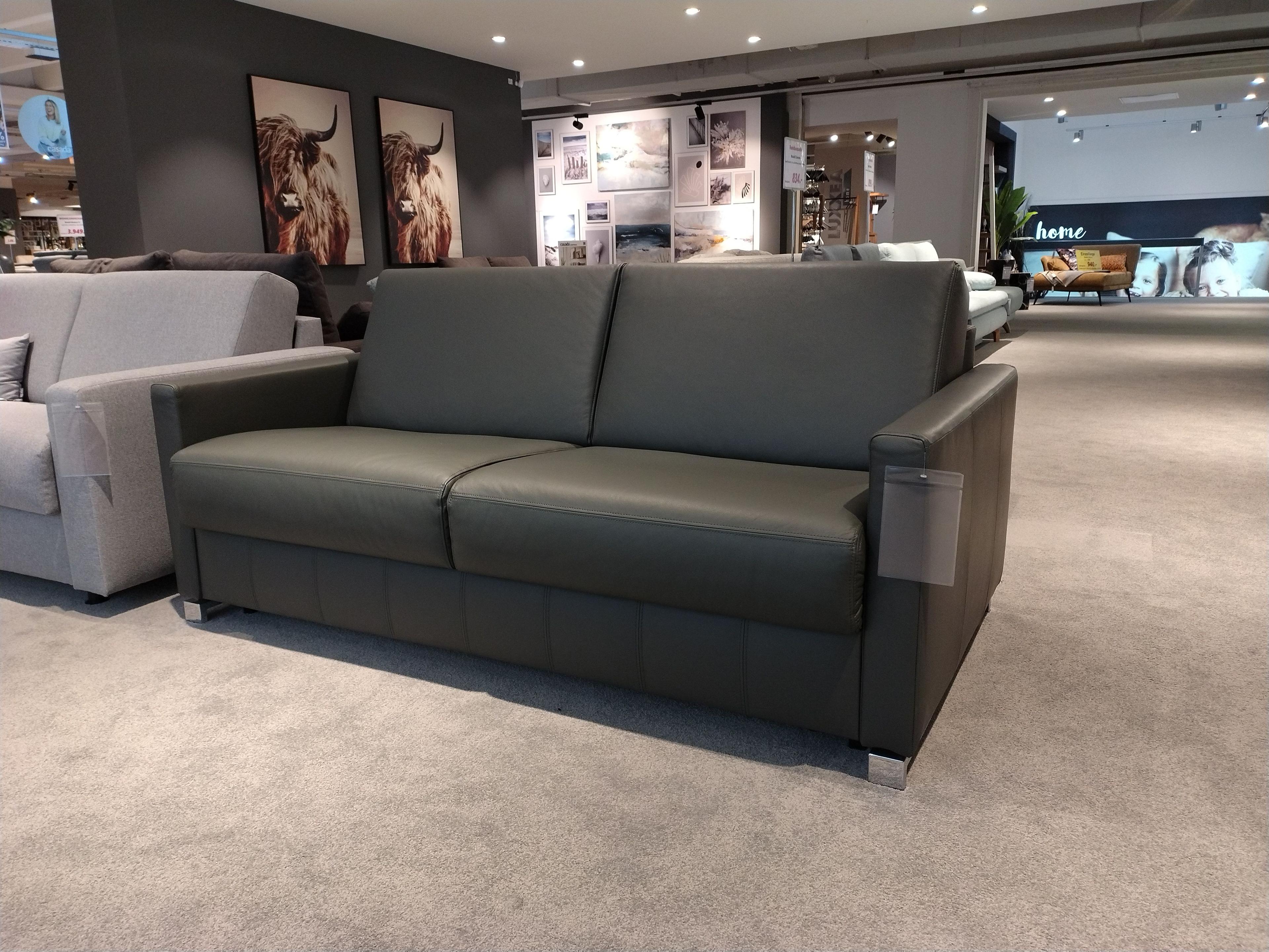 Funktionssofa in echtem Leder anthrazitfarben bezogen Bild in zusammengezogenem Zustand gerader Rücken